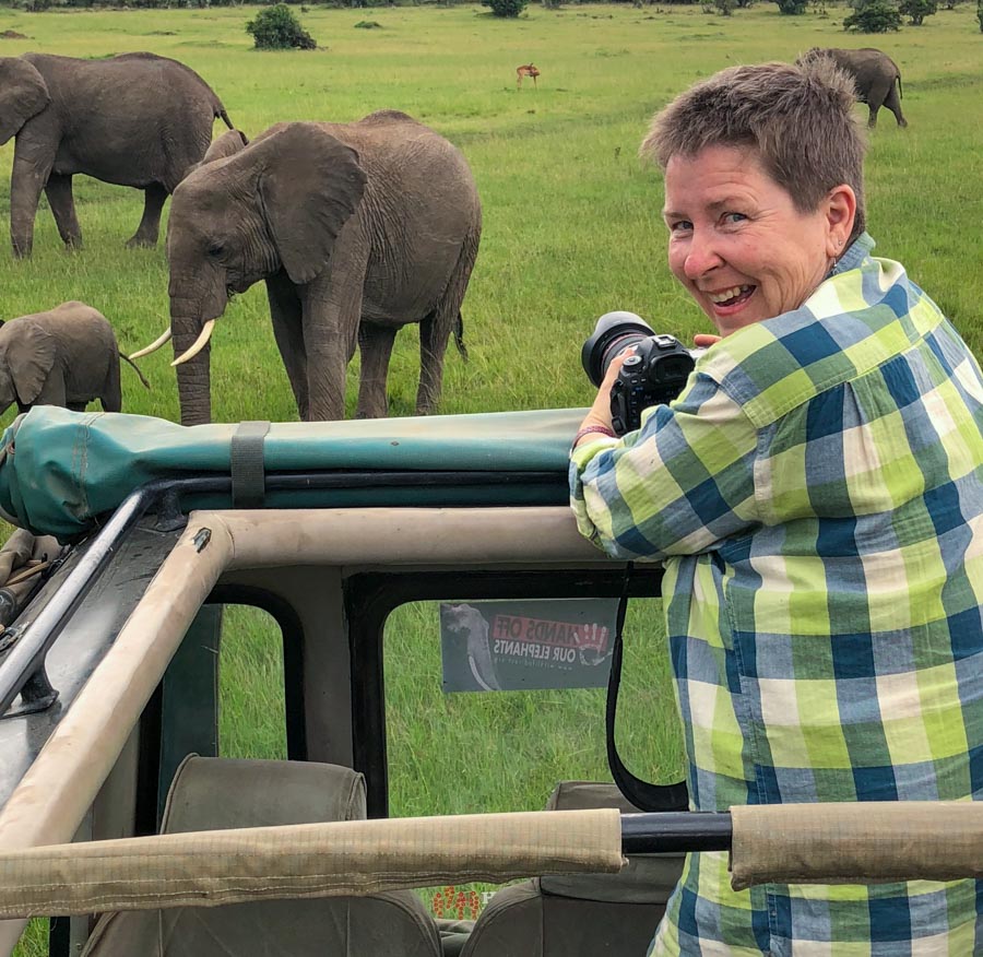NJ Wight photographing elephants on safari.
